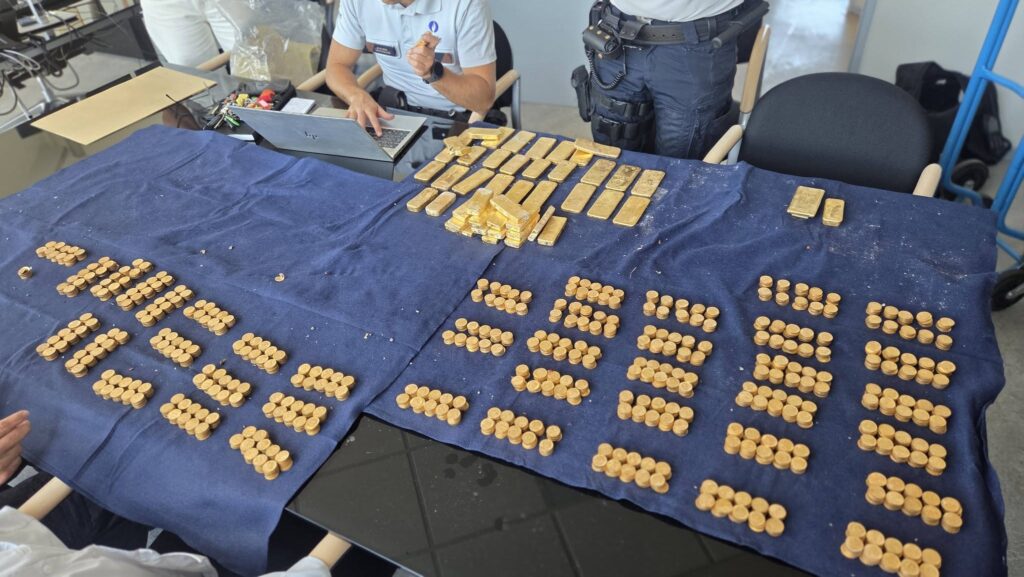 More than 40 gold bars and at least 4,000 old coins were discovered inside a chest concealed in the cellar of a building. Photo: Dendermonde Police