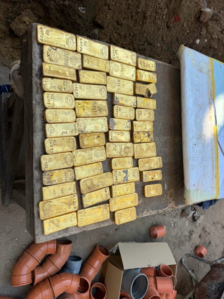 More than 40 gold bars were discovered inside a chest concealed in the cellar of a building. Photo: Dendermonde Police