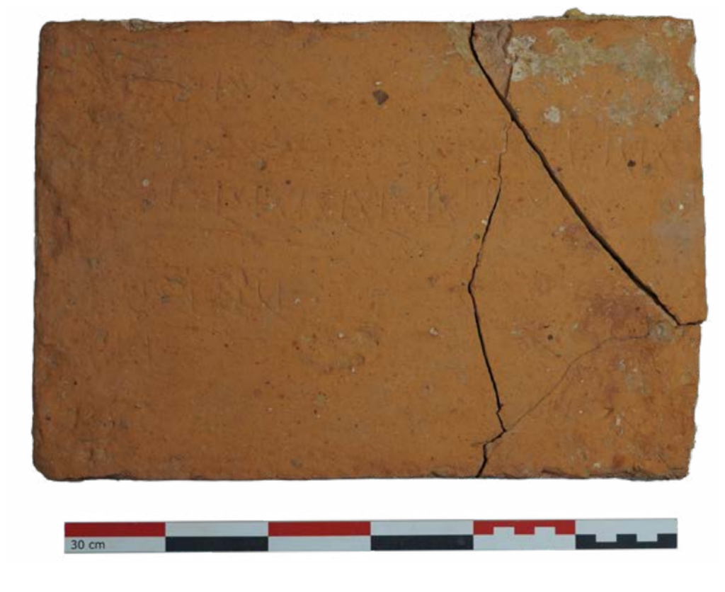 Inscribed tile from the Roman villa at Buschdorf-Helperterwee. INRA suggests the inscription may represent an account kept by a tiler working in the production workshop. Credit: L. Maue / INRA.