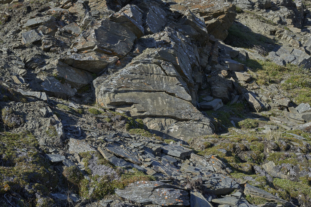 D.M. Pavlov and A.A. Chernukhina photographing Pegtymel petroglyphs for three-dimensional modeling in Chukotka.