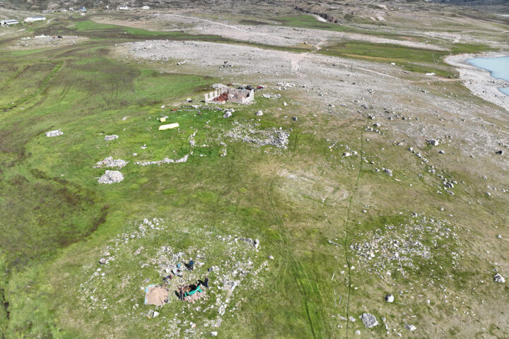 The church ruins are visible in the foreground.