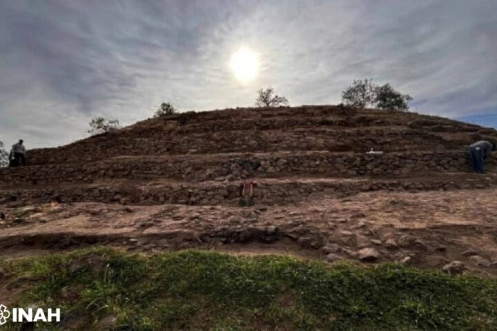 Sun shining above the stepped stone structure at Teteles de Ávila Castillo, an archaeological site associated with an ancient solar observatory in Mexico.
